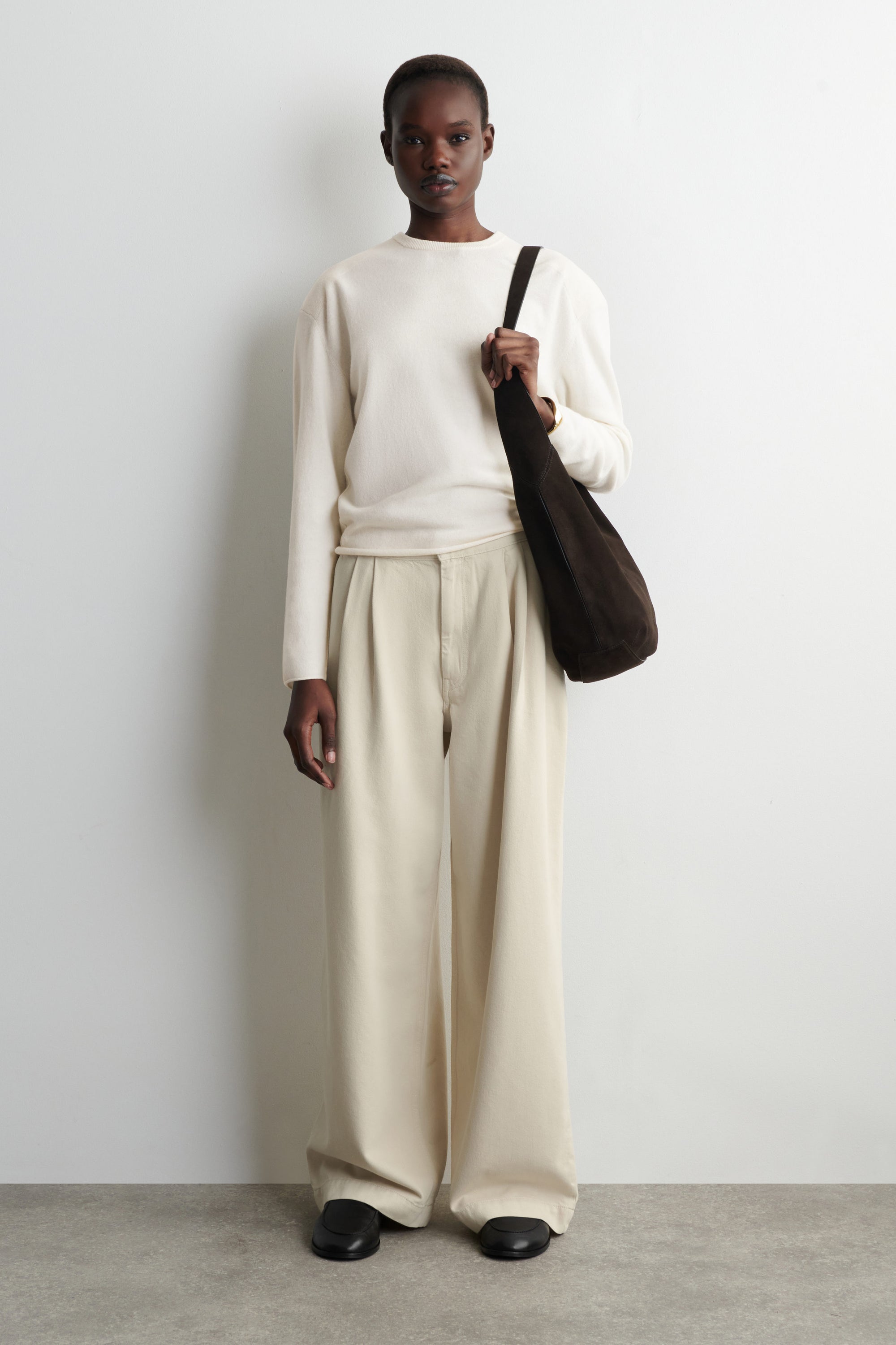 PLEATED WIDE-LEG DENIM PANTS